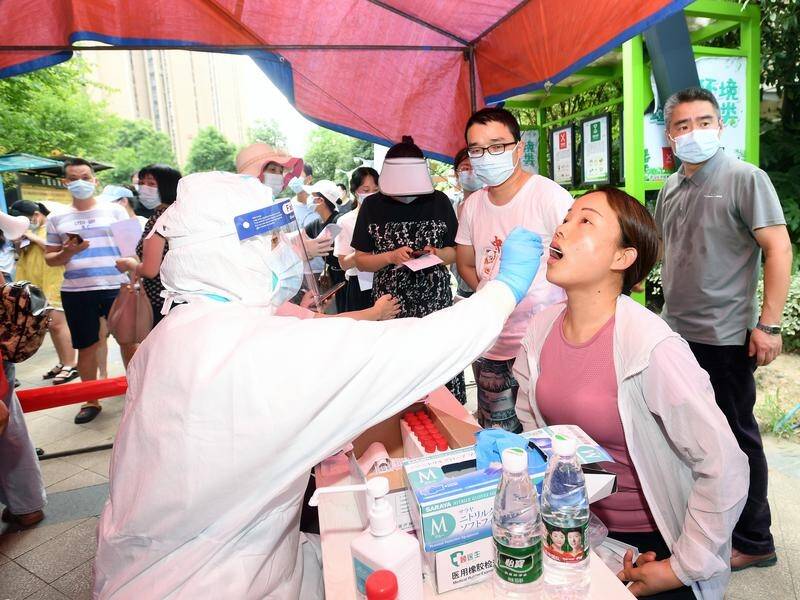 China has reported the most new locally transmitted COVID-19 cases since January.