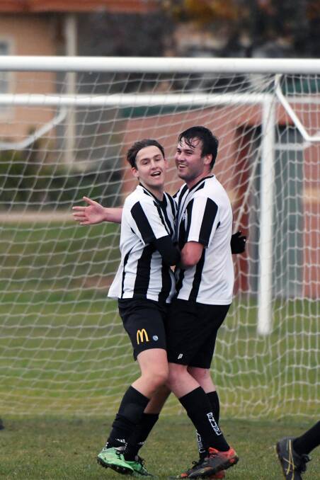 Alexander Worthington and Jacob Coxall (North United) celebrate a goal. Picture: Kate Healy