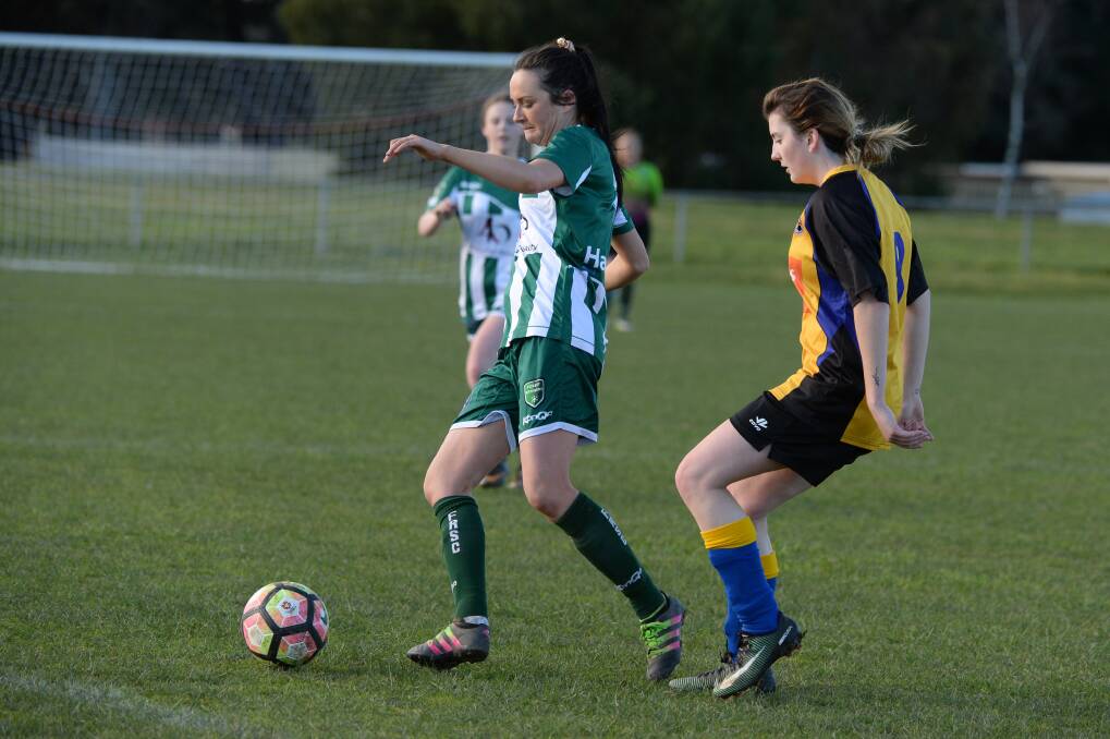 STRONG EFFORT: Kirsty Payton playing for Forest Rangers when the team met Bacchus Marsh in a match last season. Picture: Kate Healy
