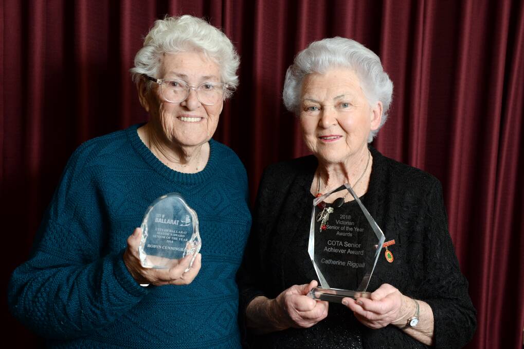 PROUD MOMENT: Mayor's Award for Ballarat Senior of the Year winner Robyn Cunningham and Victorian Senior of the Year's COTA senior achiever award winner Catherine Riggall with their trophies. Picture: Kate Healy 
