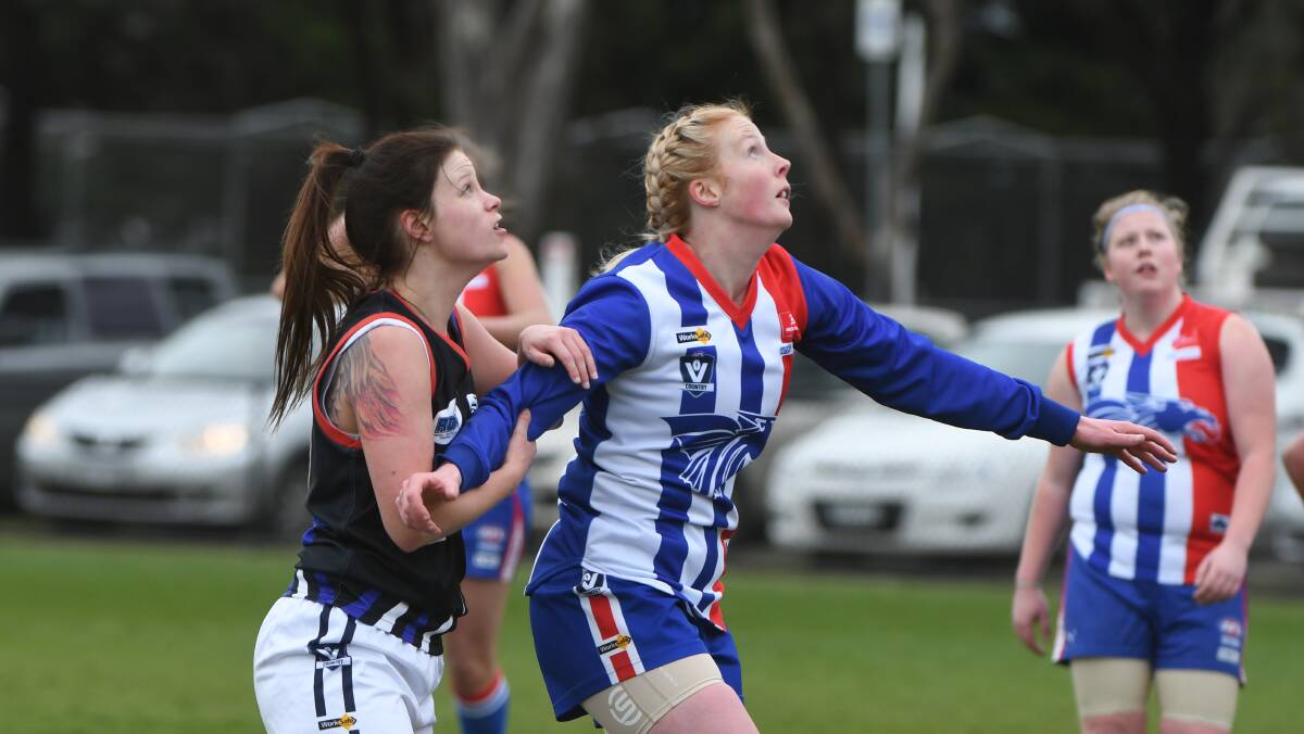 COMPETITIVE: Gisborne's Alana Preston and East Point's Jessie Cartledge in a ruck contest during Sunday's preliminary final at Alfredton Oval. 