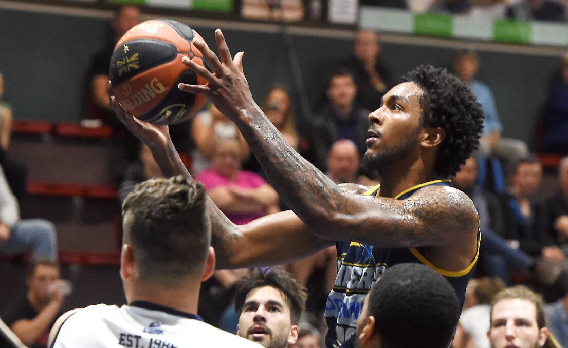 IMPACT: Ballarat Miners import Davon Usher, pictured in the game against Frankston in April, stepped up after a quiet night against North-West Tasmania. Picture: Lachlan Bence 