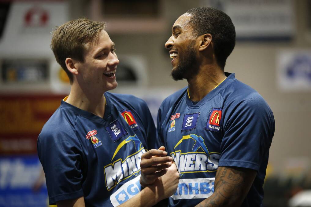 FRIENDSHIP: Ballarat Miners teammates Sam Short and Davon Usher share a laugh before the game against Mount Gambier on Saturday night. Both have made strong contributions during the season. Picture: Dylan Burns