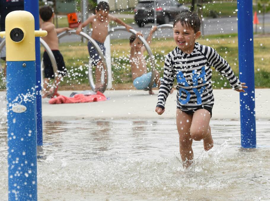 READY FOR SUMMER: Four-year-old Alby Skrokov dances his way through the water at the Midlands Reserve and Water Park as the temperature soared. Picture: Lachlan Bence