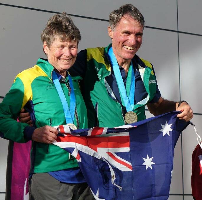 SUCCESSFUL: Husband and wife Geoff and Jenny Lawford stood proudly on the podium after winning their respective sprint orienteering events. 