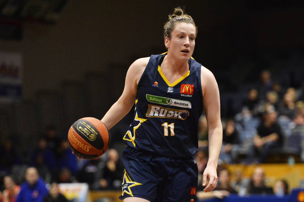 RETURNING HOME: Ballarat Rush captain Kristy Rinaldi dribbles the ball down the court in a home game at the Minerdome, where the team will play on Saturday against a top three Nunawading. Picture: Dylan Burns. 