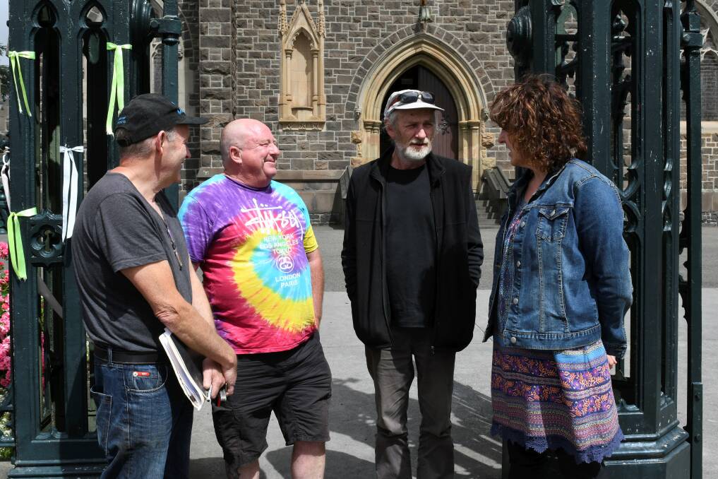 SPEAKING UP: Ballarat survivors Gary Sculley, Tony Wardley and Paul Auchettl with their good friend Maureen Hatcher outside St Patrick's Cathedral on Wednesday. Picture: Lachlan Bence