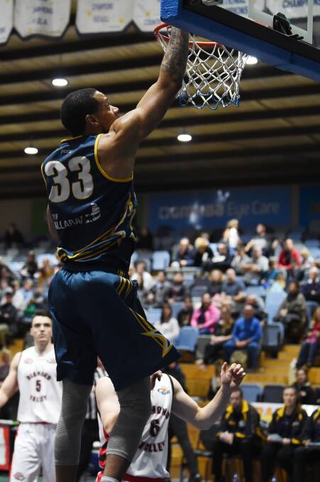 Ballarat Miner Marvin King-Davis goes for the dunk. Picture: Kate Healy