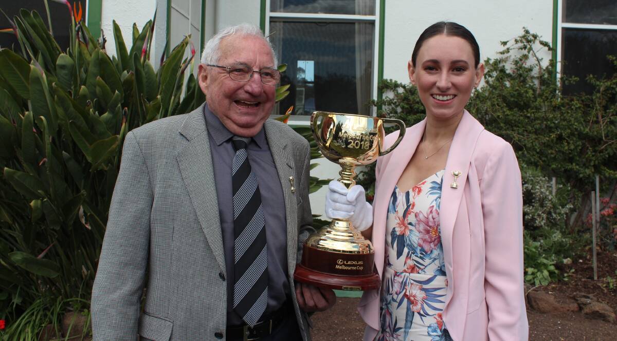 Mick Robins and Katelyn Mallyon with the Melbourne Cup trophy. Picture: Supplied 