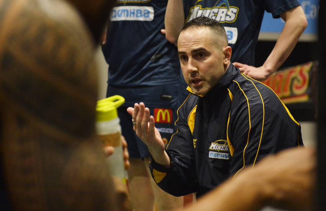 FINAL CHANCE: Ballarat Miners coach Nathan Cooper-Brown addresses his players during a break in a semi-final at the Minerdome on Saturday night. 