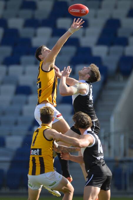 FLYING HIGH: North Ballarat's key ruckman Nick Knott competed against tough opposition before coming off with an injury in the third quarter. Pictures: Dylan Burns