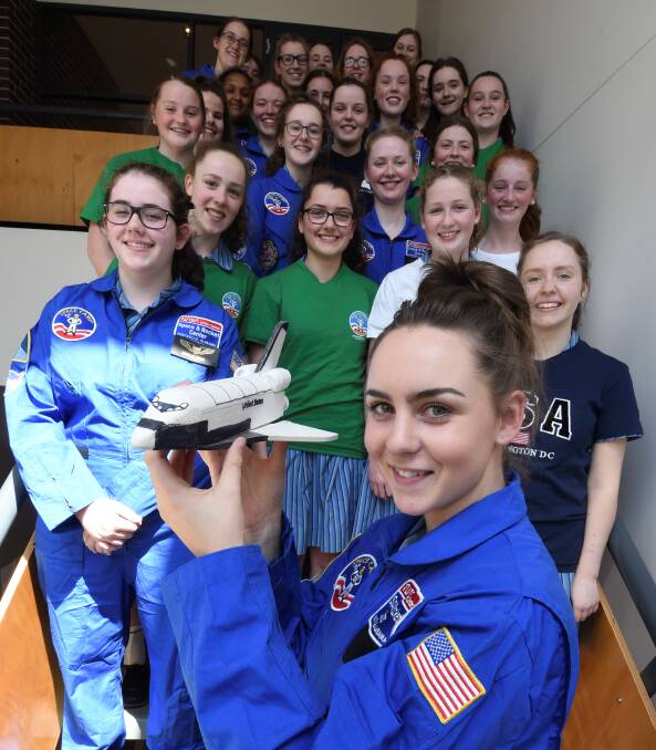 TRIP OF A LIFETIME: Macaylah Johnson with some of the Loreto students, who attended space camp during their school holidays. Picture: Lachlan Bence.
