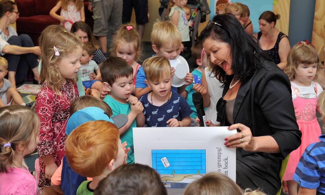 ENGAGEMENT: Mayor Samantha McIntosh reads to children in a special story time at Ballarat Library on Wednesday morning. Picture: Lachlan Bence 