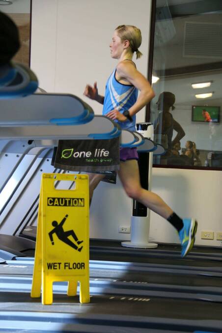 Natasha Fraser chasing the world record on the treadmill. Picture: Aaron Coulter 