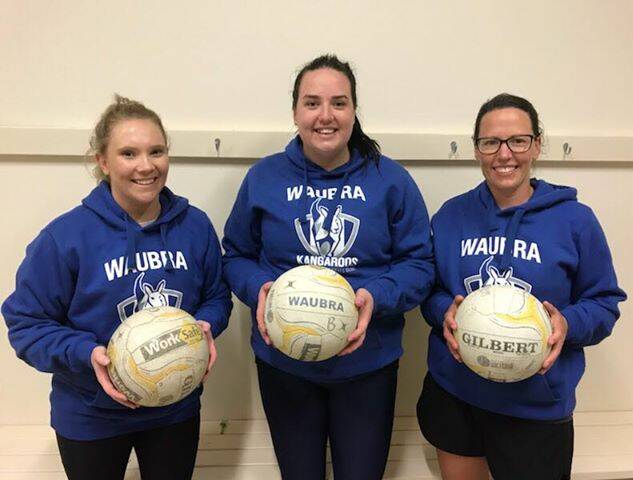 CELEBRATION: Waubra players Erin Loader, Sophie Cullinan and Toni Briody have all had different journeys, but they've shared success together.