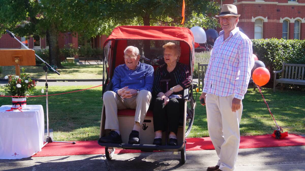 OUT AND ABOUT: Residents Adele Byrnes and Bruce Green enjoy a ride in the trishaw, which is designed to help seniors enhance their sense of social connectedness.