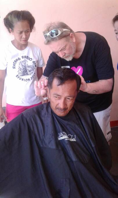 VOLUNTEER: Ballarat hairdresser Darren Dubberley spent time in the Philippines earlier this year to teach his skills to those looking for a way forward. Picture: Supplied