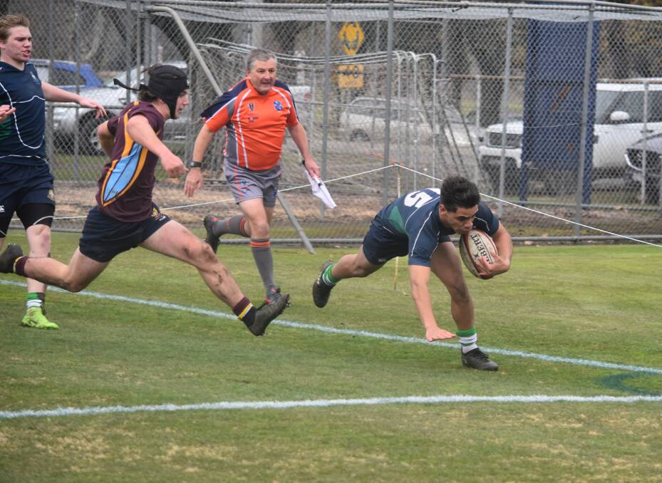 TALENTED: Josh Wilson-Stanton scoring St Patrick’s College’s first try against Marcellin College. The young gun is an under-16 player in an under-18 team. Picture: Paul Nolan