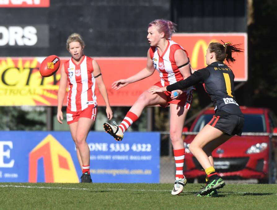 COBRAS STRIKE: Ballarat's Emily Pollard and Bacchus Marsh's Courtney Scott compete in an AFL Goldfields Women's Competition round 11 clash at Alfredton Reserve on Sunday. Picture: Kate Healy
