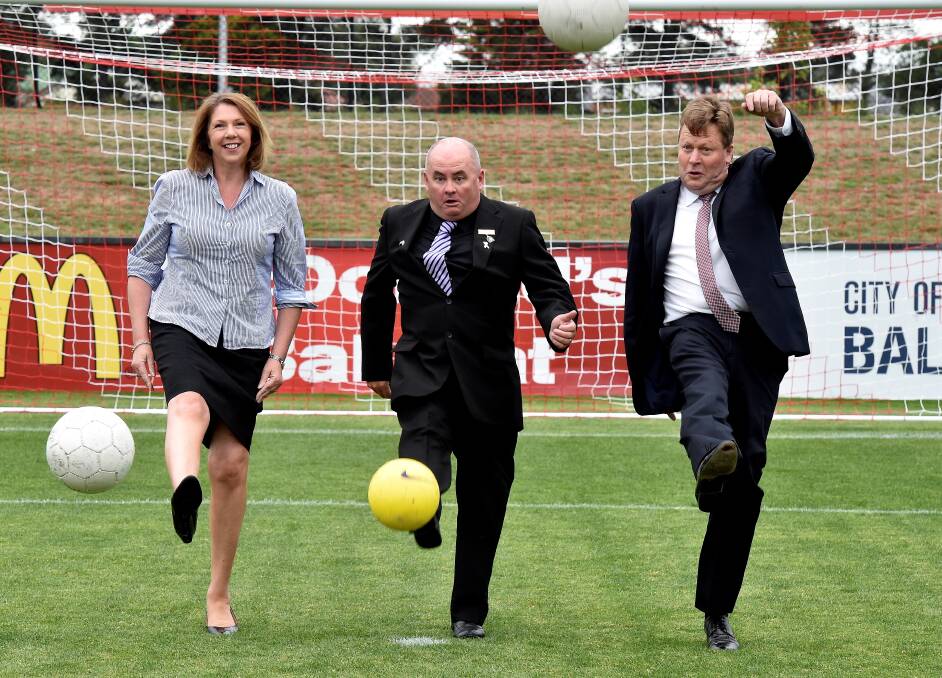 Kicking goals: Ballarat MP Catherine King, Ballarat Regional Soccer Facility chairman Des Hudson and Senator Michael Ronaldson at the opening of the facility on Saturday morning. PICTURE: JEREMY BANNISTER