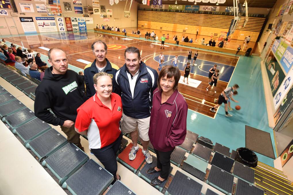 Stretched to capacity: Club presidents Jamie Bobrowski (Drummo Dragons), Jeff Horgan (Wildcats), Paul Aikman (Saints), Candice Scott (Celtic Tigers) and Di Nevett (Exies-Acmy). PICTURE: LACHLAN BENCE