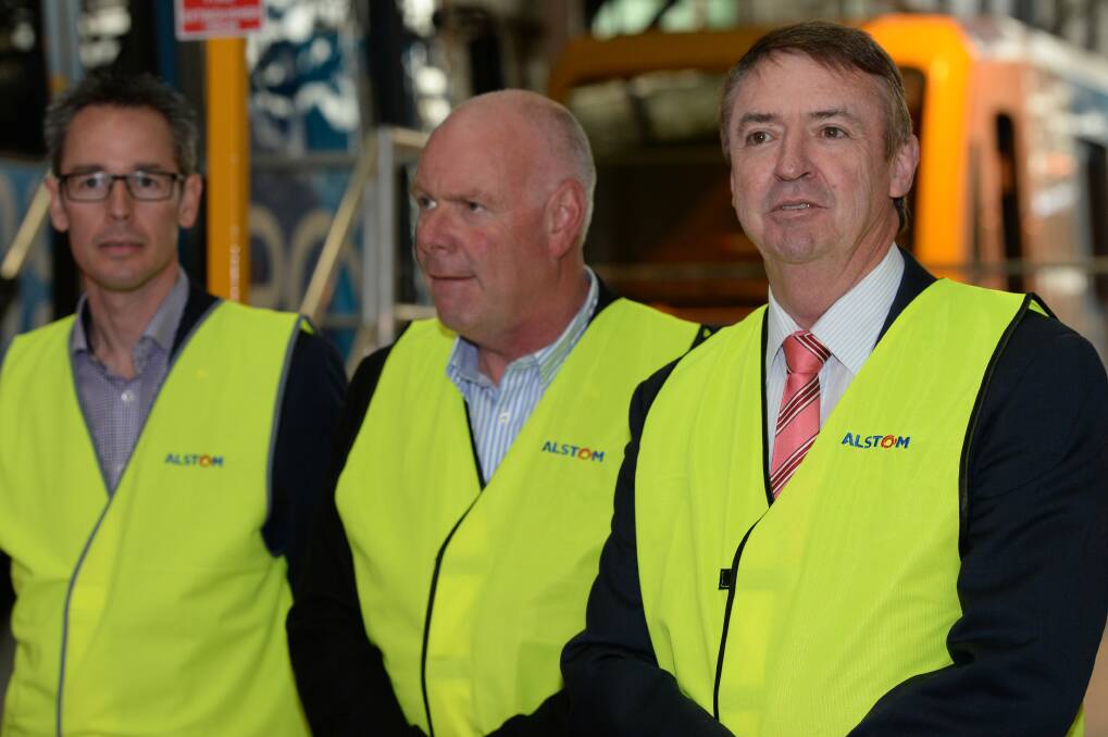 Commitment: Liberal candidate for Buninyong Ben Taylor, Liberal candidate for Wendouree Craig Coltman and Transport Minister Terry Mulder at Alstom in Ballarat on Monday. PICTURE: KATE HEALY