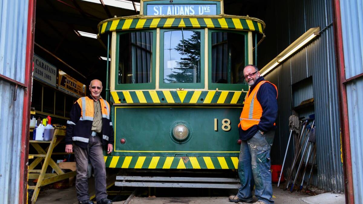 Renewal: Roger Gosney and Peter Waugh with the historic Tram No.18 at the Ballarat Tramway Museum. PICTURE: Dylan Burns 