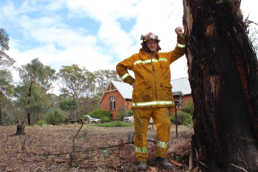 30 years on:  Ian Burt, now the Talbot CFA captain, in front of the old Amherst School building. PICTURE: DAVID JEANS