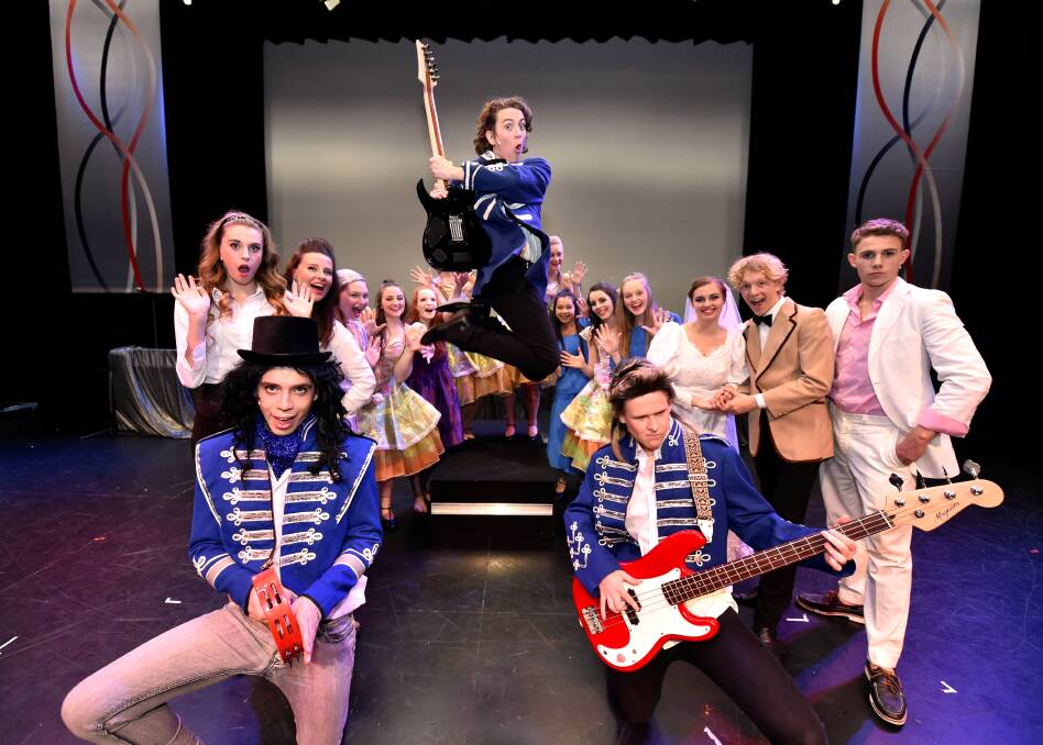 Sing along: Ballarat Clarendon College students rehearse for their performance of The Wedding Singer. PICTURE: JEREMY BANNISTER