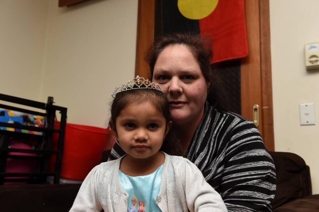 Shattered: Three-year-old Samara, with mother Rachel Muir, was racially abused at a Disney event after dressing up as Queen Elsa from animated feature film Frozen. PICTURE: LACHLAN BENCE
