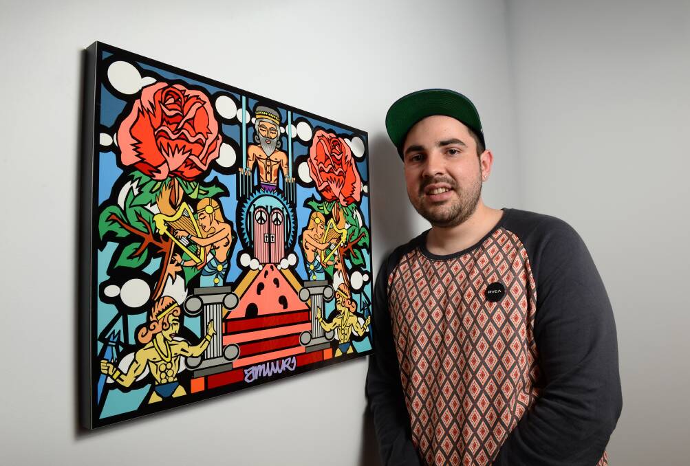 Winner: Josh Muir, pictured with his piece ‘Heavens Gates’ at the Art Gallery of Ballarat, has won the People’s Choice Award at the Victorian Indigenous Art Awards. PICTURE: ADAM TRAFFORD