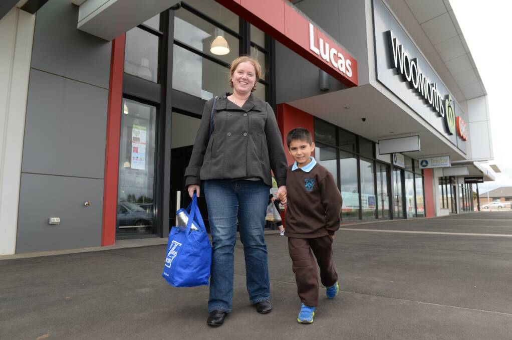 GROWTH: Alfredton residents Alicia Juarez and Noah, 5, shopping at the nearby Lucas Town Centre yesterday which is the heart of Ballarat’s western growth area. PICTURE: KATE HEALY 