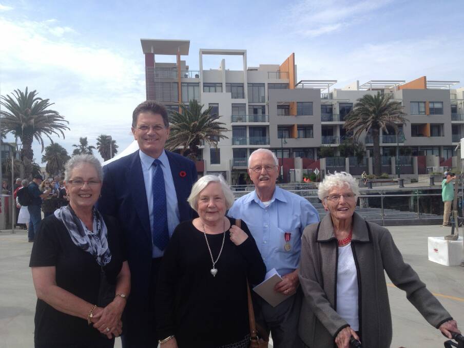 Remembered: Faye Weeks, Anzac centenary patron and former Victorian premier Ted Baillieu, Jennifer Weeks, Brian Weeks and Dorothy Easton (nee Weeks) at the commemoration at Princes Pier in Port Melbourne.
