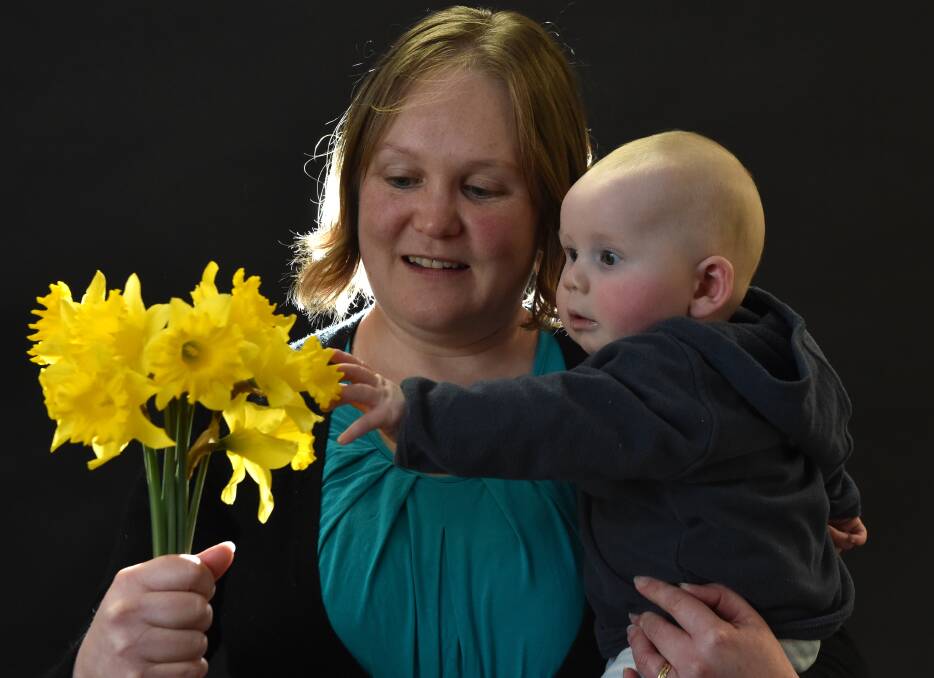 SUPPORT: Amanda Anderson, with son Huon, will man the Stockland Wendouree Daffodil Day stall. PICTURE: JEREMY BANNISTER