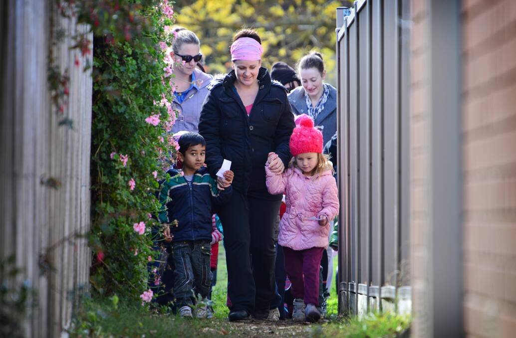 Walking with friends: Alfredton kindergarten teacher Shona Williams with some of her pupils. PICTURE: DYLAN BURNS
