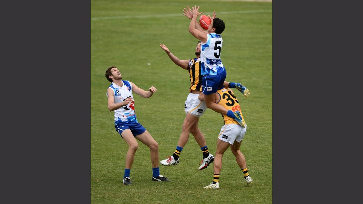 James Keeble (Roosters) flies high over the pack. - VFL North Ballarat Roosters vs Sandringham. Pictures Adam Trafford 
