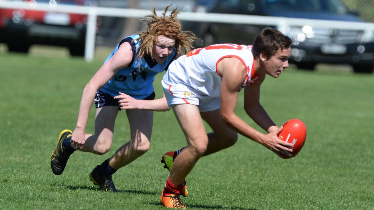 V/LINE UNDER-15 SCHOOLBOY FOOTBALL CHAMPIONSHIPS - DIV 3 - ROUND 1 - Ballarat v South West. Billy Galpin (South West) and Daniel Howell (Ballarat). PIC: KATE HEALY