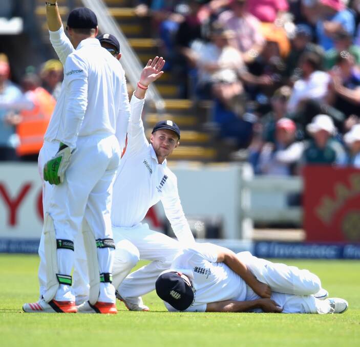 Alastair Cook lies on the ground in pain after being hit in the groin during day two of the 1st Investec Ashes Test match between England and Australia at SWALEC Stadium on July 9, 2015. Photo: Getty Images.