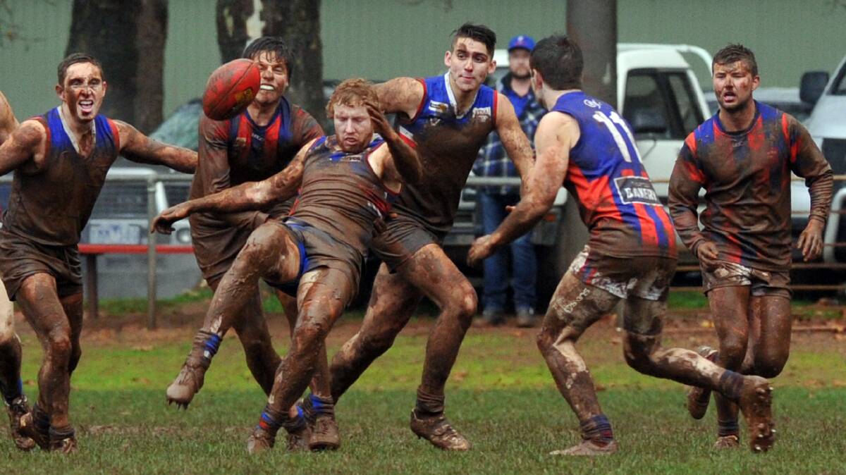 Winter has well and truly arrived in the CHFL. Just asked these mud-caked Hepburn and Daylesford players. Photo: Julie Hough