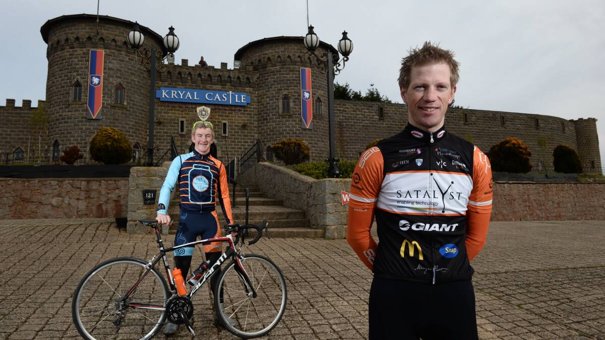 Ballarat cyclists Liam White, left and Pat Shaw in front of Kryal Castle, which overlooks the finish of the Melbourne to Ballarat road race. Photo: Adam Trafford