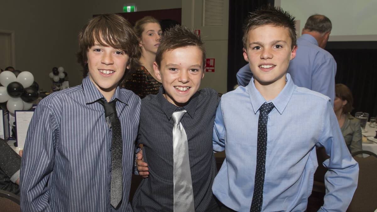 ROOSTERS: BFNL under-12 seniors best and fairest Jamie Quick, right, with North Ballarat teammates Isaac Carey, left, and Sam Joyce. Picture: Shawn Smits.
