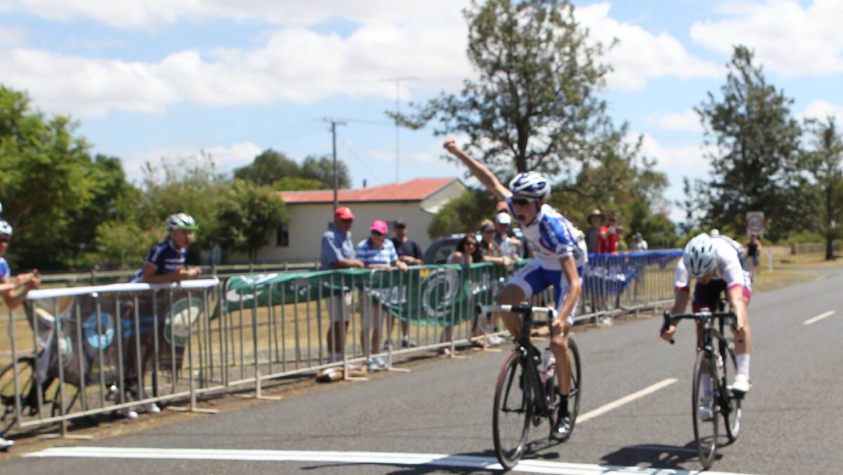 Ballarat Clarendon College student and Ararat cyclist celebrate a win on the road earlier this year.