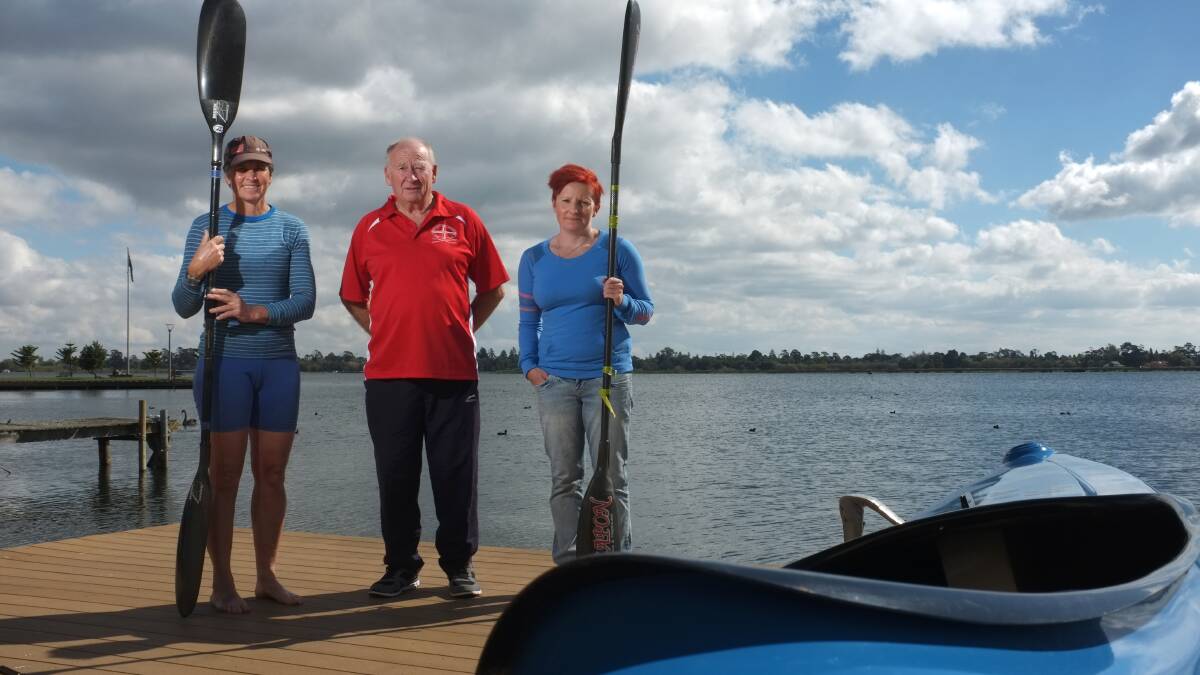 President Ballarat Canoe Club president Graeme Bowes with competitors Tanya Beacham and Nicole Scullion all ready for the national marathon titles. Photo: Justin Whitelock            