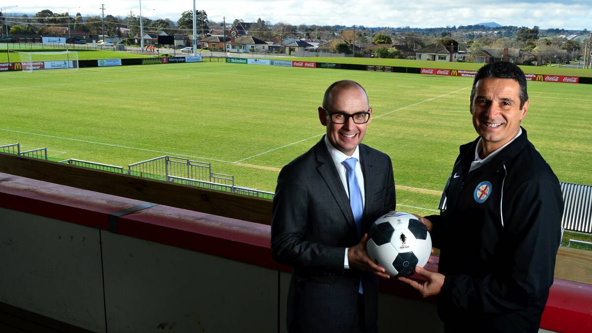 Melbourne City FC CEO Scott Munn, left, with the club's national youth league team head coach Joe Palatsides overlooking Morshead Park main pitch. 