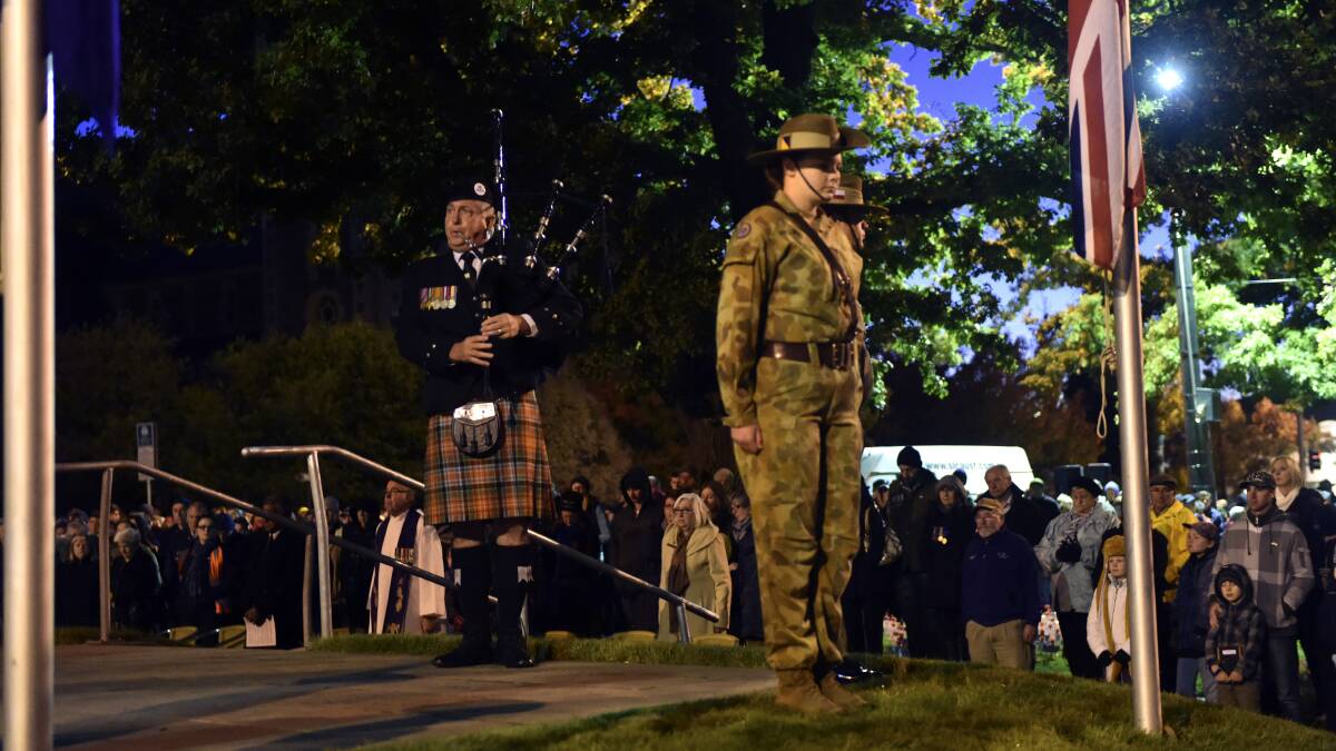 The Catafalque and Flag Party and Piper Neil McDonald. PICTURE: JEREMY BANNISTER