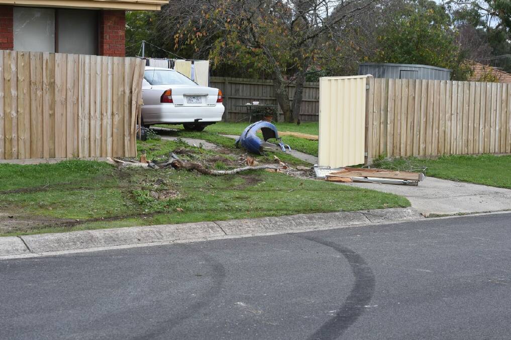 Skid marks visible heading into the fence. PICTURE: LACHLAN BENCE