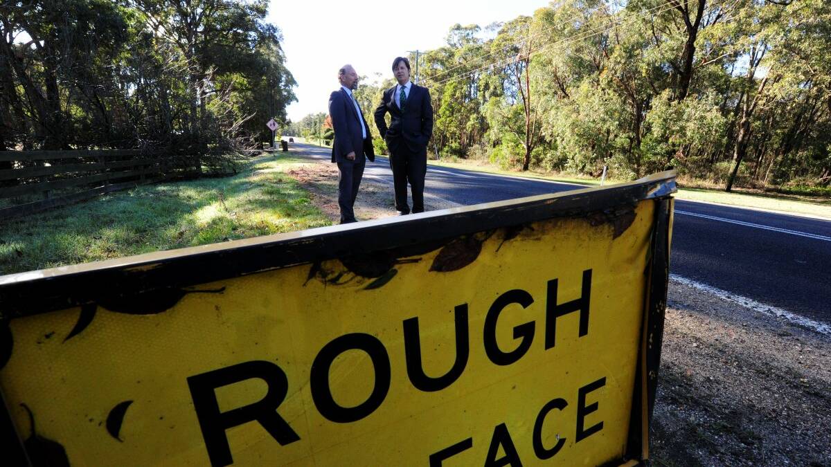 Ballarat East MP Geoff Howard and Labor roads spokesman Luke Donnellan inspect Ballarat-Colac rd last year. File image