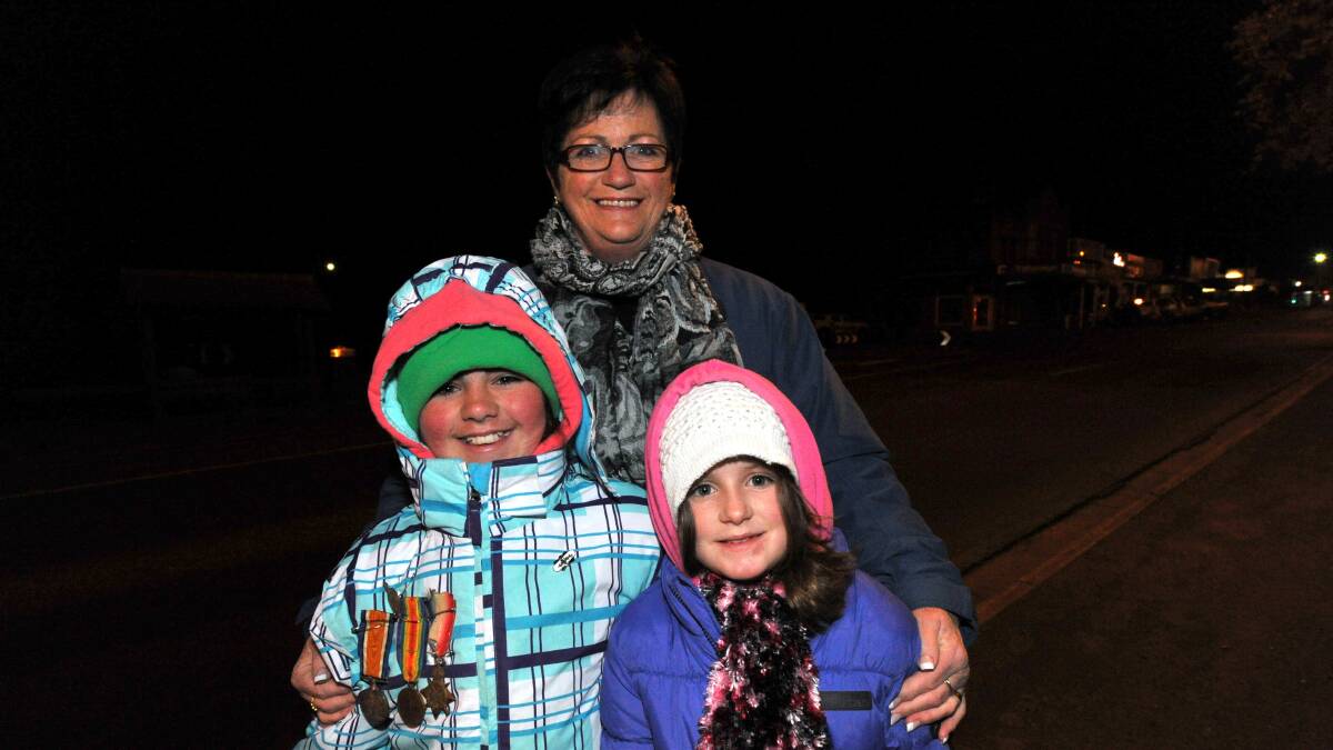 Debbie Watts with Felicity Dean and Rhianna Watts at the dawn service. PICTURE: JEREMY BANNISTER