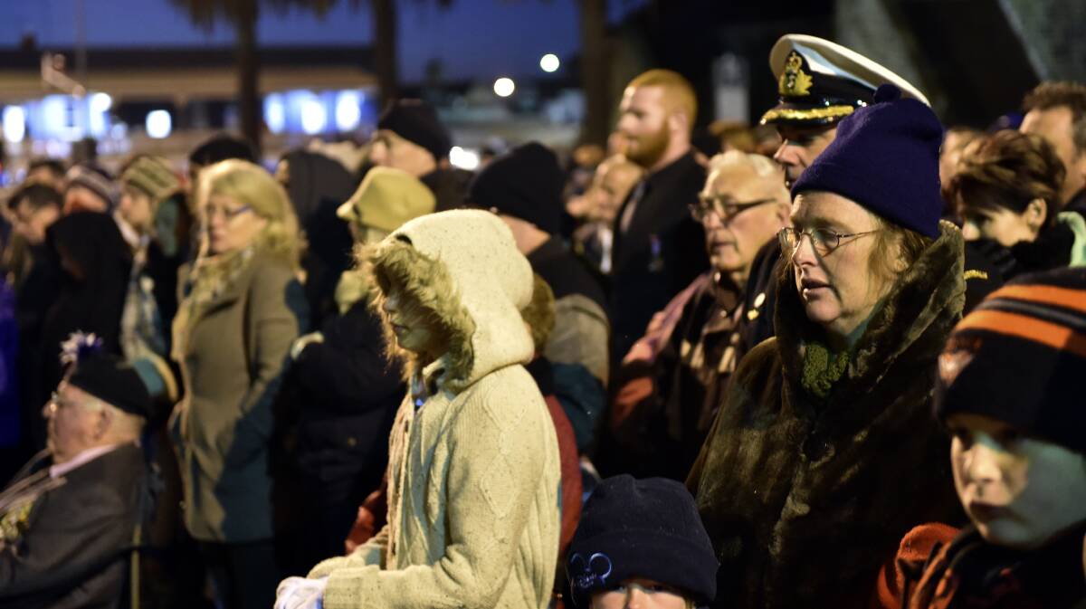 Crowds brave the cold conditions at the dawn service. PICTURE: JEREMY BANNISTER
