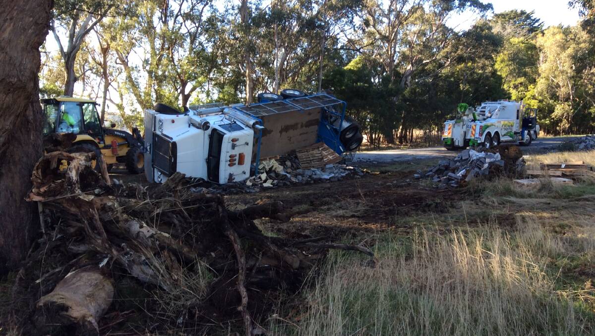 The truck on its side on Monday morning. PICTURE: DAVID JEANS